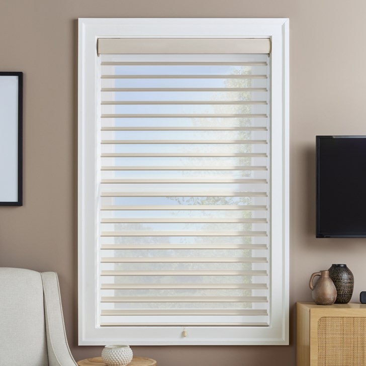 Opacity: Room Darkening; Color: Straw S70PN414D; Lift: Cordless; Valance: Fabric Wrapped Round Cassette; Setting: Day Time; State: Lowered and Open