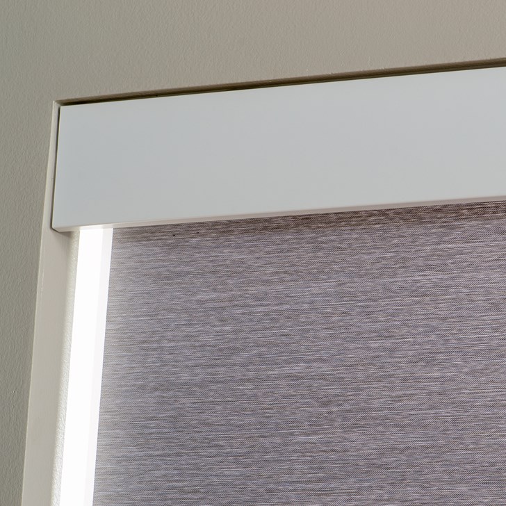 Opacity: Light Filtering; Color: Vantage Fog F0871; Lift: Continuous Corded Loop Plastic White; Roll Direction: Standard; Valance: White Square Aluminum Fascia; Hem Bar: Plain White