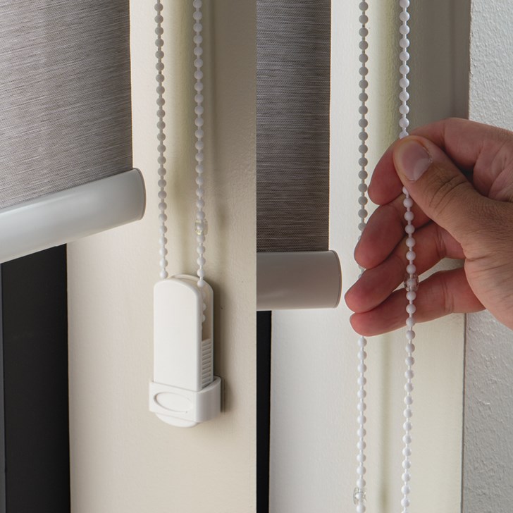 Opacity: Light Filtering; Color: Vantage Fog F0871; Lift: Continuous Corded Loop Plastic White; Roll Direction: Standard; Valance: White Square Aluminum Fascia; Hem Bar: Plain White